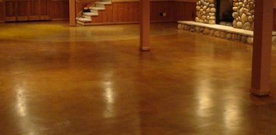 Polished and stained concrete basement floor.
