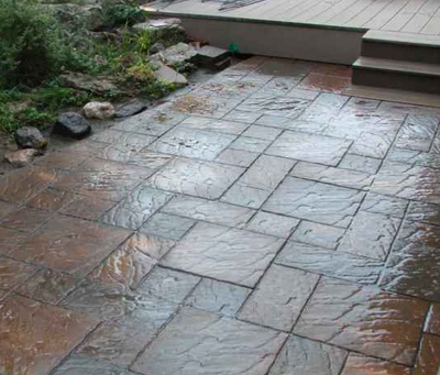 Paver style stamped concrete walkway and patio.