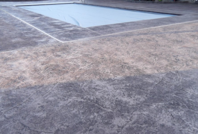 Gray textured pool deck.