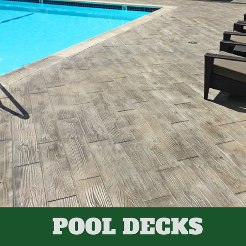 Roanoke stamped concrete pool surround with a wood grain finish.