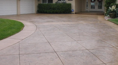 Brown stained stamped concrete driveway in Roanoke, VA.